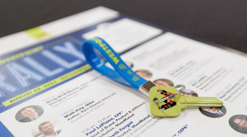 Image of a key with the WestPoint logo on it and a WestPoint lanyard.