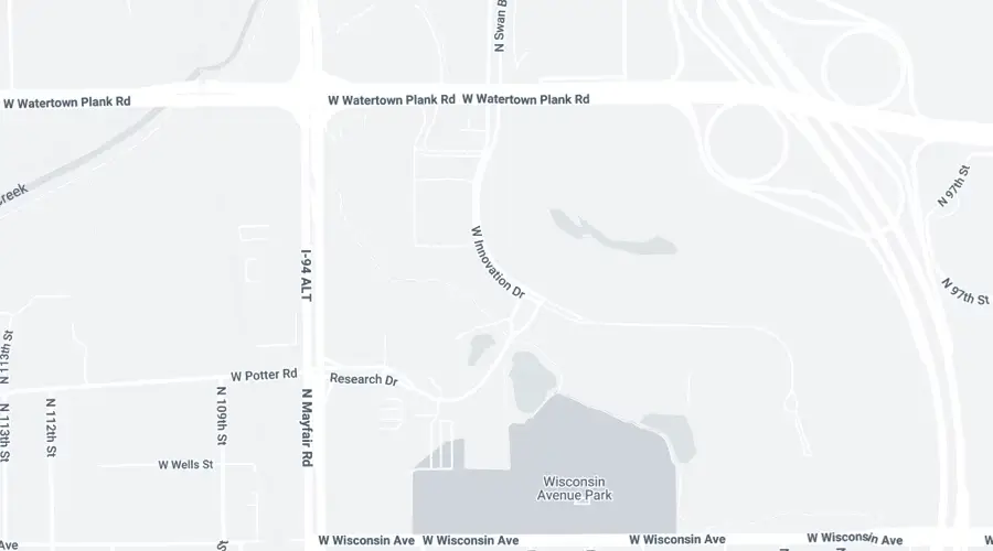 Map showing roads including W Watertown Plank Rd, W Wisconsin Ave, Research Dr, N Mayfair Rd, and I-94 ALT, near Wisconsin Avenue Park.